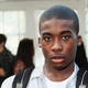 Classmates say Ombale, who once watched his tortured father beg for his life, is a “weird, quiet little dork.”